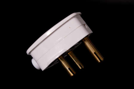 Electric Plug on black background with selective focus