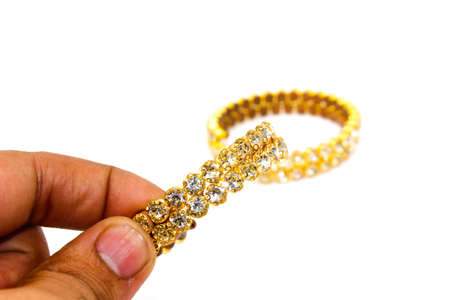 A picture of gold plated diamond bracelets with selective focus