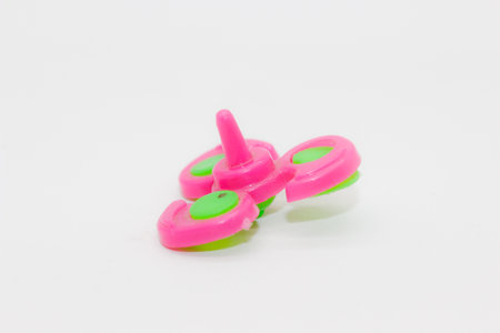 Toy spinner isolated on white backgroundの写真素材
