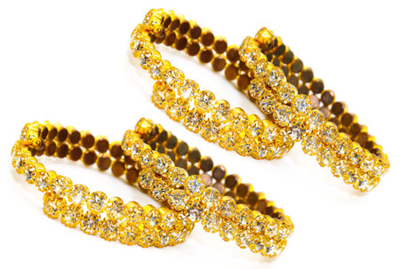 A picture of gold plated diamond bracelets with selective focusの写真素材