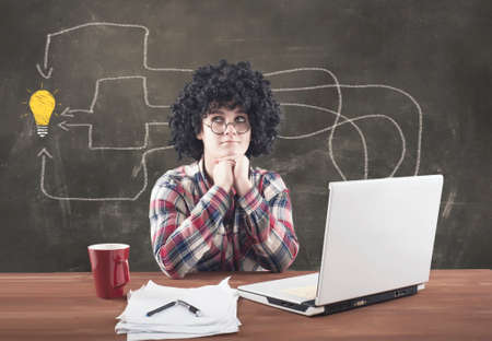 Teenager girl using the laptop computer is having an idea