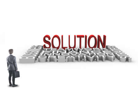 Young businessman and solution concept; words laying on groundの写真素材