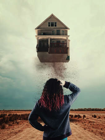 House take off from the ground to the sky, owner of the house looks confused .の写真素材