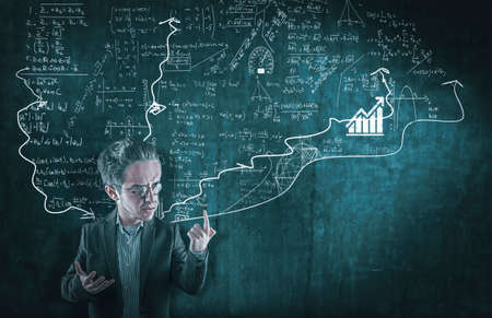 Teacher explain a math formulas drawn on wall.