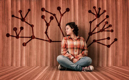 Woman in a wooden room with a network tree drawn on wall.