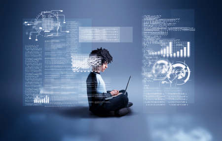 Businessman working on laptop .Futuristic user interface.