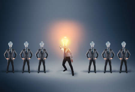 Group of businessman with lightbulbs instead of head.Elite business team . Businessman in fight...