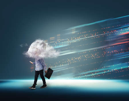 businesman with a cloud on head and data bytes infromation transfering on blue background .の写真素材