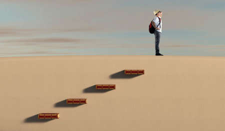 Young man climbed a stairway of books and looks for future opportunities . Scholarship concept .の写真素材