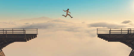 Man jumps over gap of a bridge at high altitude above clouds . Overcoming problems and motivation concept . This is a 3d render illustration .の写真素材