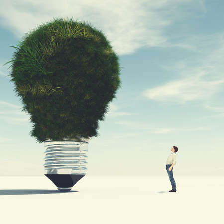 Man looks up to a lightbulb made of grass . This is a 3d render illustration .
