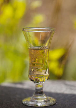 Liqueur in a glass outdoors
