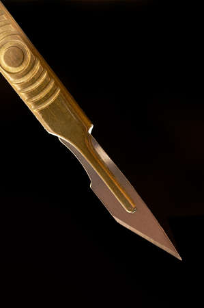 Scalpel, surgical knife.