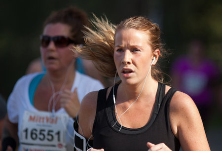 STOCKHOLM SEPTEMBER 06 2014. TJEJMILEN.  A running race each year in Stockholm with only female participants.のeditorial素材