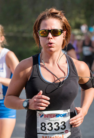 STOCKHOLM SEPTEMBER 06 2014. TJEJMILEN.  A running race each year in Stockholm with only female participants.Tanja Koskinen.のeditorial素材