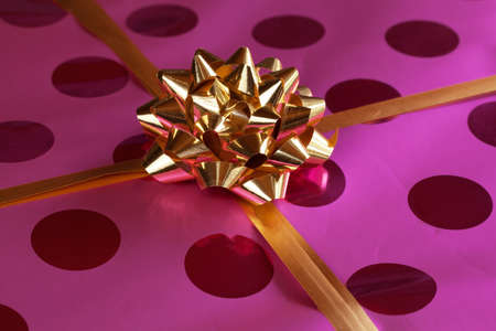 Packages with gold bowの写真素材