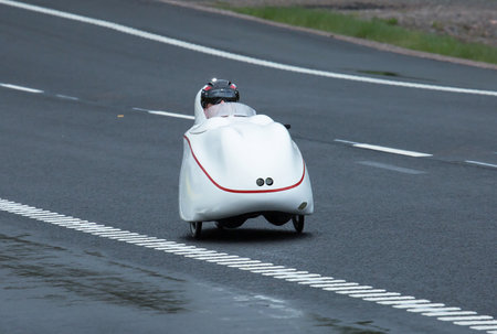 TROSA SWEDEN, May 17, 2015, biker on tour in a Velomobile. A man on a bike ride in an unusual vehicle.のeditorial素材