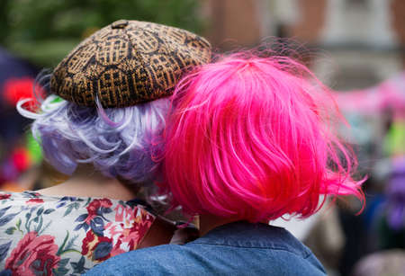  Street party in Stockholm. Women in wigs with bright colors.の写真素材