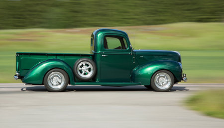 TROSA SWEDEN, 25 JUNI 2015. FORD PICKUP year 1941. The car photographed driving so that the background will be blurred.のeditorial素材