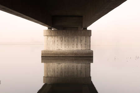 Concrete bridge over waterの写真素材