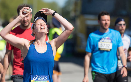 STOCKHOLM SWEDEN 4 JUNE 2016.  Stockholm marathon, female athlete in the race.のeditorial素材