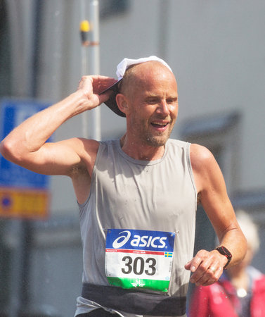 STOCKHOLM SWEDEN 4 JUNE 2016. Stockholm marathon, male athlete in the race. Johan Malk (SWE).のeditorial素材
