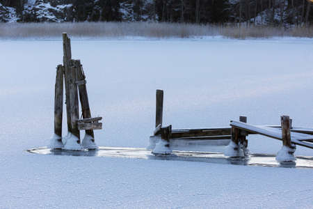 Frozen lake on a cold winter day.の写真素材
