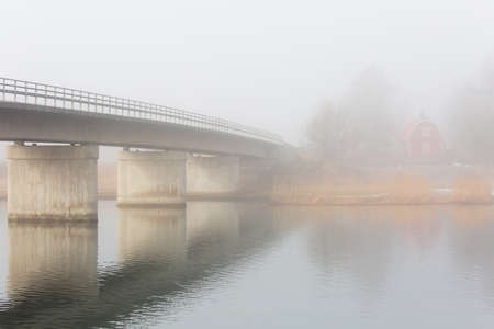 HOLO SWEDEN March 10, 2016. Typical Swedish cottage in strong fog.の写真素材