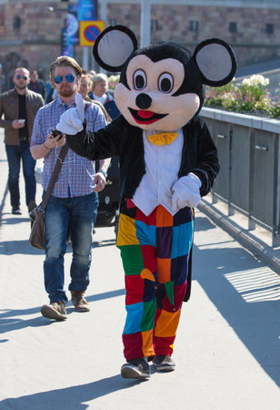 STOCKHOLM Sweden 4 May, 2016. Beggars dressed as Mickey Mouse.のeditorial素材