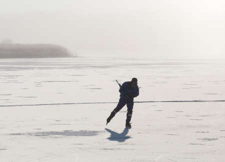 TROSA SWEDEN Jan 19 2016. A man on skates on a frozen sea.の写真素材