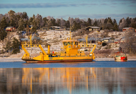STOCKHOLM SWEDEN 15 Jan 2016. A ferry transporting people and vehicles between the two islands.のeditorial素材