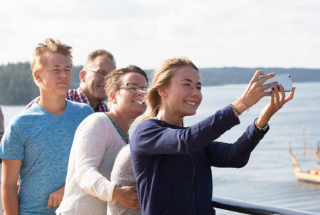 STOCKHOLM SWEDEN, 26 JULY 2017. Family photograph themselves.のeditorial素材