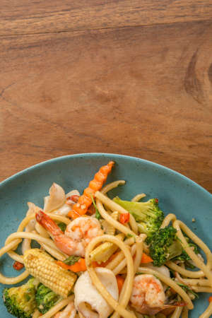 Spaghetti with spicy seafood asian style - street foodの写真素材