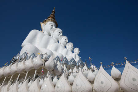 Big white buddha statue isolated on blue sky at new popular Public Temple in Phetchabun (in the north of Thailand) "Wat Pha Sorn Kaew" Picture in January, 2017の写真素材