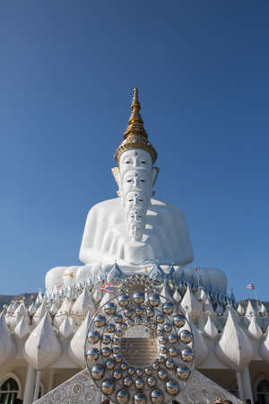 Big white buddha statue isolated on blue sky at new popular Public Temple in Phetchabun (in the north of Thailand) "Wat Pha Sorn Kaew" Picture in January, 2017の写真素材