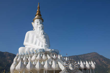 Big white buddha statue isolated on blue sky at new popular Public Temple in Phetchabun (in the north of Thailand) "Wat Pha Sorn Kaew" Picture in January, 2017の写真素材