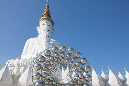 Big white buddha statue isolated on blue sky at new popular Public Temple in Phetchabun (in the north of Thailand) "Wat Pha Sorn Kaew" Picture in January, 2017の写真素材