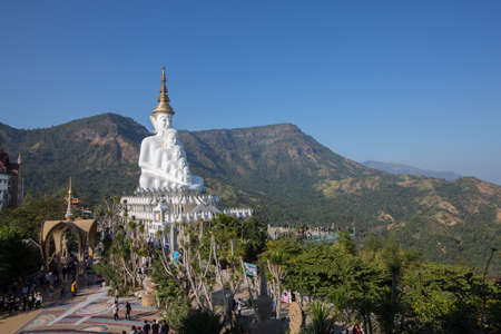 Big white buddha statue isolated on blue sky at new popular Public Temple in Phetchabun (in the north of Thailand) "Wat Pha Sorn Kaew" with tourists crowded Picture in January, 2017のeditorial素材