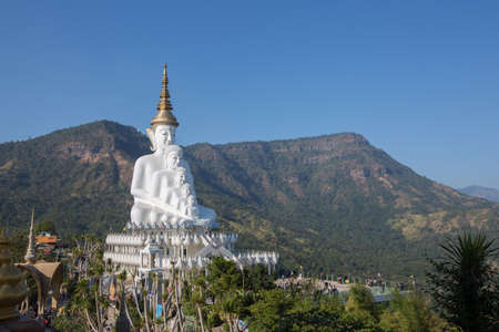 Big white buddha statue isolated on blue sky at new popular Public Temple in Phetchabun (in the north of Thailand) "Wat Pha Sorn Kaew" with tourists crowded Picture in January, 2017のeditorial素材
