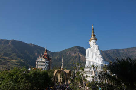 Big white buddha statue isolated on blue sky at new popular Public Temple in Phetchabun (in the north of Thailand) "Wat Pha Sorn Kaew" with tourists crowded Picture in January, 2017のeditorial素材