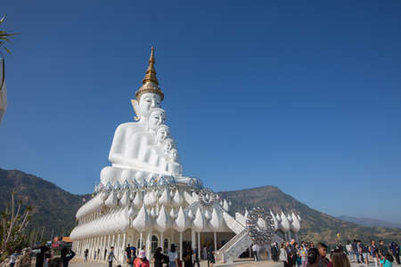 Big white buddha statue isolated on blue sky at new popular Public Temple in Phetchabun (in the north of Thailand) "Wat Pha Sorn Kaew" with tourists crowded Picture in January, 2017のeditorial素材