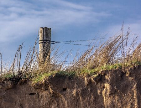 Costal erosion at Fraisethorp beach East Yorkshireの写真素材