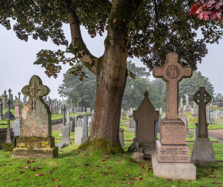 Scotland, Stirling, 02/10/2020 - Old Town Cemetery with head stones and statues.