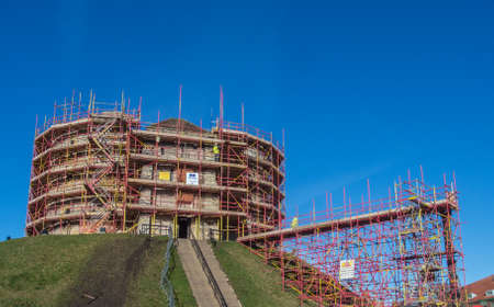 York, Yorkshire, UK, 01/02/2021 - Repair work at Cliffords Tower in York with scaffolding and blue sky.のeditorial素材