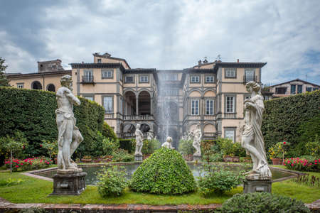 Luuca, Tuscany, Italy, 09 May 2022 - Gardens of Pfanner villa inside Medieval city walls of Lucca, with grass fountains and statues.のeditorial素材