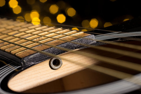 guitar, Truss rod on a blurred background with highlights , close-up, details