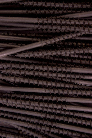 The screws form a solid background. taken in close-up