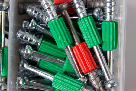 dowels and screws in a case on a white background