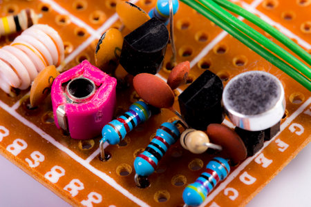 circuit board with soldered radio components, resistors, transistors, diodes, inductors and...