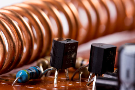 circuit board with soldered radio components, resistors, transistors, diodes, inductors and...